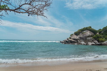 Sea, rocks, sandy beaches and the beautiful nature of Tayrona National Park in Colombia.