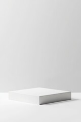 Minimalist White Box Positioned Elegantly on a Clean Surface Inviting Curiosity and Creativity in a Bright, Modern Space