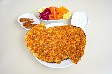 Kiymali pide.Turkish pide with minced meat. Turkish pizza mince pita Pide on white . Etli ekmek.Kusbasi kasarli, kiymali kasarli, kiymali yumurtali, Bafra, Trabzon, Kusbasili pide. Urfa acili lahmacun