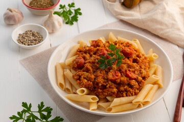 Penne macaroni with Meat and sausage sauce,Easy Penne pasta tossed with a simple tomato sauce with...