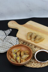 Delicious Pempek with Savory Sauce, Indonesian Street Food