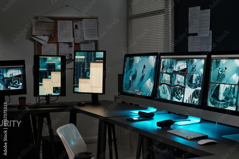 Poster row of desktop computer monitors with records of cctv video cameras on screens standing on workplace