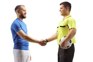 Football player shaking hands with a referee