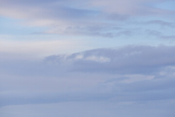 Peaceful Sky with Soft Blue and White Cloud Formations