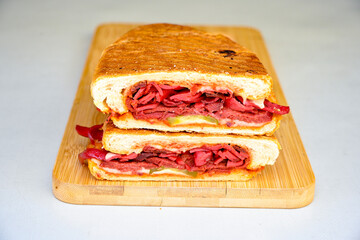 Turkish karisik atom kare  tost ( kasarli bazlama tost) . Sucuklu, Kasarli,  cheddarli, kavurmali karisik tost. Flat baked bread toasted. Karisik bazlama tost .