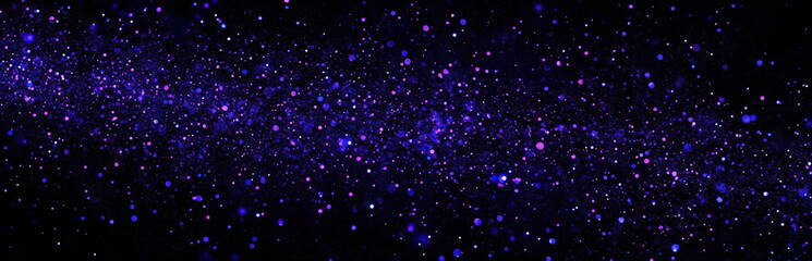 Fototapeta premium A stunning array of colorful stars and cosmic dust fills the space, showcasing a beautiful galaxy. The deep purple and blue hues create a mesmerizing spectacle of the universe.