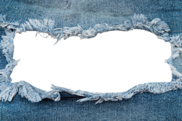 Hole in denim on a white background. Ripped jeans