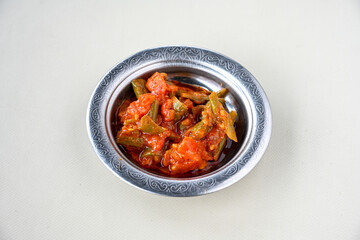 A spicy Turkish appetizer ezme made with tomatoes, bell pepper, parsley, mint, olive oil and hot chili. A kind of adjika. Kahvaltilik acuka, Antep usulu acili ezme. Acili Biber borani. 