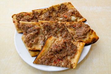 Kiymali pide. Turkish pide with minced meat. Turkish pizza mince pita Pide on white background. Etli ekmek. Kusbasi kasarli, kiymali kasarli, kiymali yumurtali, Bafra, Trabzon, Kusbasili pide.