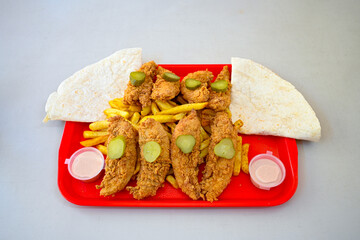 Homemade fried chicken nuggets isolated on white background. Chicken nugget. Citir tavuk. Citir, tavuk atistirma  tabagi.