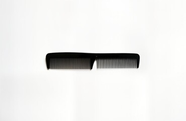 Black barber comb on plain white background. Pro hairdressing tool. Simple styling accessory for salon barbershop. Useful for hair care, style. Suitable for various hair types, looks. Versatile tool