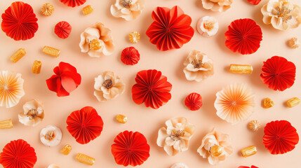 Fototapeta premium A vibrant arrangement of decorative flowers and embellishments on a soft background.