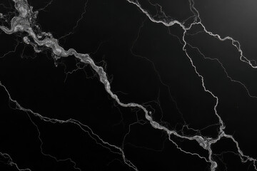 Abstract black and white marble texture with dramatic veining pattern and copy space