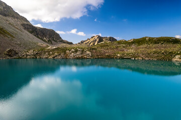 Beautiful aerial view of a mountain lake in a picturesque gorge. Landscape and nature of the North Caucasus