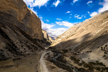 Fototapeta premium Beautiful aerial view of a mountain road. Landscape and nature of the North Caucasus