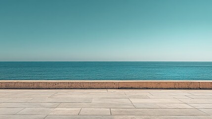 Fototapeta premium vast, empty concrete expanse stretching into the distance under a serene, cloudless blue sky.