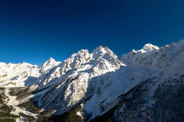 Aerial panorama overlooking mountain peaks. Landscape and nature of the North Caucasus