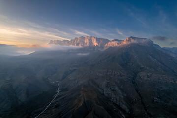 Fototapeta premium Mountains in the clouds. Low clouds in the North Caucasus mountains