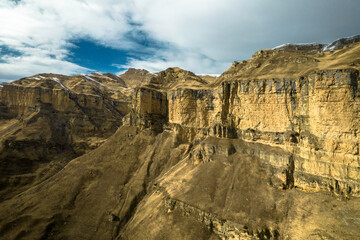 Beautiful aerial view of a mountain range with high cliffs. Landscape and nature of the North Caucasus