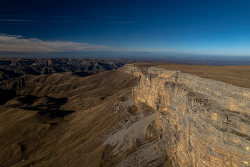 Beautiful aerial view of a mountain plateau with high cliffs. Landscape and nature of the North Caucasus