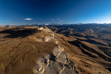 Beautiful aerial view of a mountain plateau with high cliffs. Landscape and nature of the North Caucasus