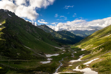 Obraz premium Beautiful aerial view of a mountain lake in a picturesque gorge. Landscape and nature of the North Caucasus