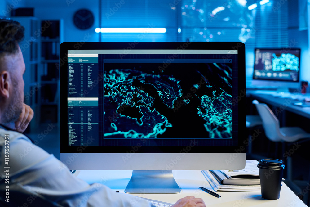 Aufkleber focus on screen of computer with graphic information standing on workplace of professional male offi
