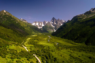Aerial panorama overlooking mountain peaks. Landscape and nature of the North Caucasus