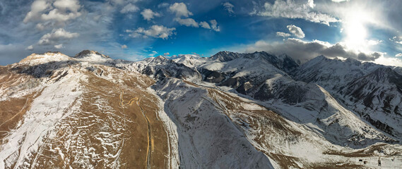 Aerial panorama overlooking mountain peaks. Landscape and nature of the North Caucasus