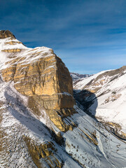 Beautiful aerial view of a mountain range with high cliffs. Landscape and nature of the North Caucasus