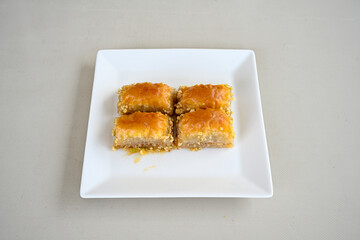 Turkish Dessert Sobiyet, havuc dilimi, midye baklava, mussels baklava and classic baklava with Pistachio . Cikolatali cevizli, fistikli soguk Baklava, top view.