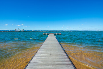 Obraz premium View of Tocantins River and the city of Palmas in the distance from Ilha Canela (Cinnamon Island)- Tocantins, Brazil