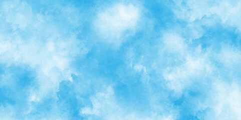 Fototapeta premium The summer heaven is colorful clearing day good weather and beautiful nature in the morning, blue watercolor wash texture design background, Pale blue sky with wispy, scattered clouds.