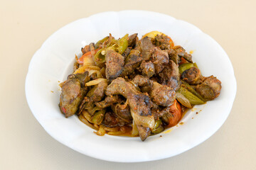 Famous Urfa meat liver, ciger wrapped by lavash with roasted chili pepper, onion and sauce in Sanliurfa, Turkey. Kuzu et ciger sis. Izgara dana bonfile, cop sis, kuzu pirzola. Karisik kebap, beyti keb