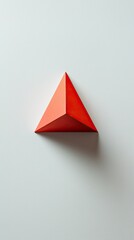 Fototapeta premium Minimalist triangular shape with textured surface placed on blank background