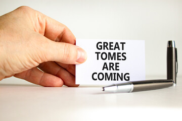 Great times are coming symbol. Concept words Great times are coming on beautiful white paper. Beautiful white background. Businessman hand. Business great times are coming concept. Copy space.