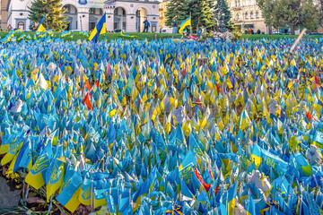 Rows of Ukrainian flags at the Lawn of National Memory on Maidan Nezalezhnosti in Kyiv honor those fallen in Russia invasion of Ukraine. Kyiv, Ukraine - October 27, 2023