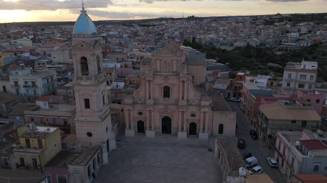 alt sunset flying clockwise around church in Ispica Sicily