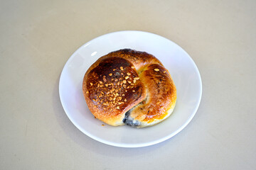 Turkish pastry product , tasty pogaca. Simit, gevrek. Turkish Pastries; peynirli, patatesli, kasarli pogaca, borek, acma, ay coregi at patisserie showcase.