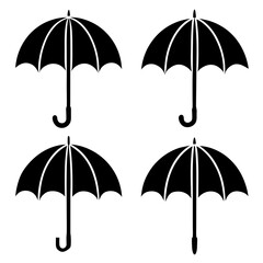 Four Simple Black Umbrellas Against a White Background