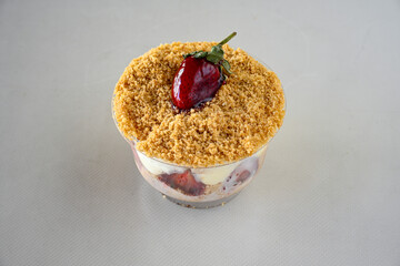 Strawberry magnolia dessert. Magnolia with strawberry and cream filling on a white background....