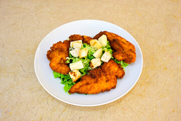 Homemade fried chicken nuggets isolated on white background. Chicken nugget. Citir tavuk. Citir, tavuk atistirma  tabagi.