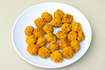 Homemade fried chicken nuggets isolated on white background. Chicken nugget. Citir tavuk. Citir, tavuk atistirma  tabagi.