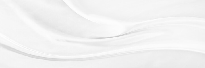 White gray satin texture that is white silver fabric silk background with beautiful soft blur pattern natural.