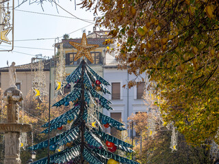 Christmas decorations in a central square in Granada (Spain) on a sunny December morning