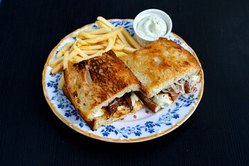 Turkish karisik atom kare  tost ( kasarli bazlama tost) . Sucuklu, Kasarli,  cheddarli, kavurmali karisik tost. Flat baked bread toasted. Karisik bazlama tost .