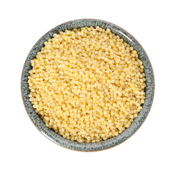 Millet groats in bowl isolated on white, top view