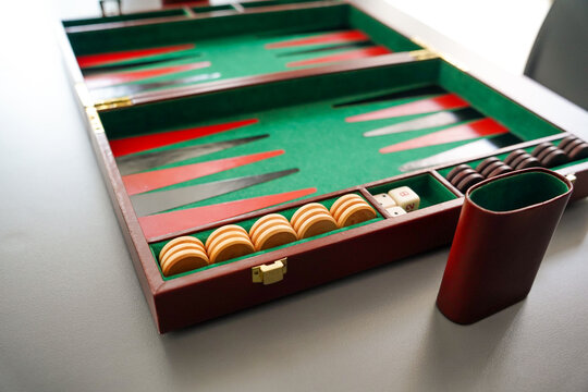 Close-up of backgammon set with checkers and dice ready for play