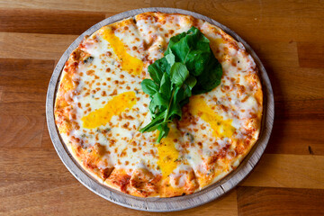 Traditional Turkish cuisine. Pizza, pita, pidesi, sucuk, hummus, kebab. Many dishes on the table. Serving dishes in restaurant. Margherita,  mix, formaggi, veggie karisik pizza. Top view, flat lay