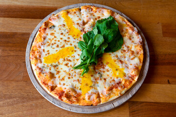 Traditional Turkish cuisine. Pizza, pita, pidesi, sucuk, hummus, kebab. Many dishes on the table. Serving dishes in restaurant. Margherita,  mix, formaggi, veggie karisik pizza. Top view, flat lay